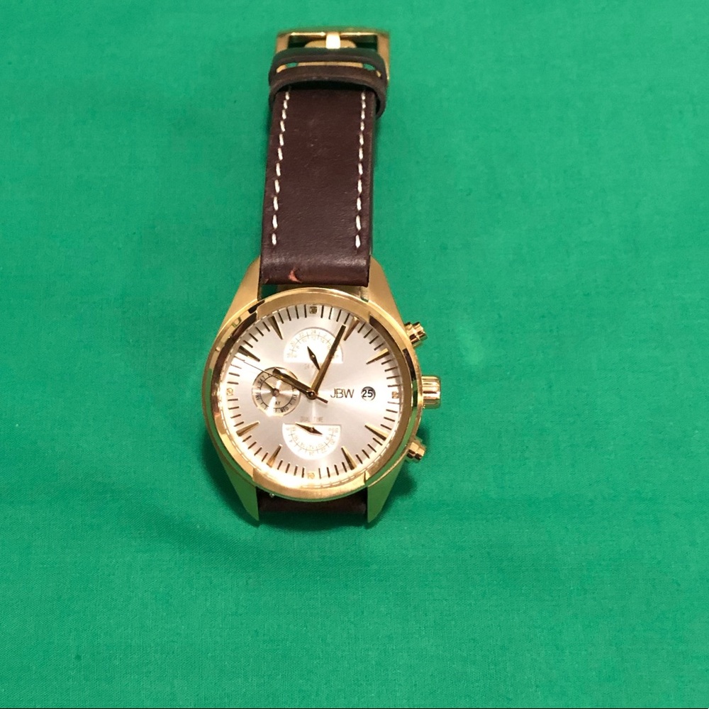JBW Woodall $655 gold with leather band